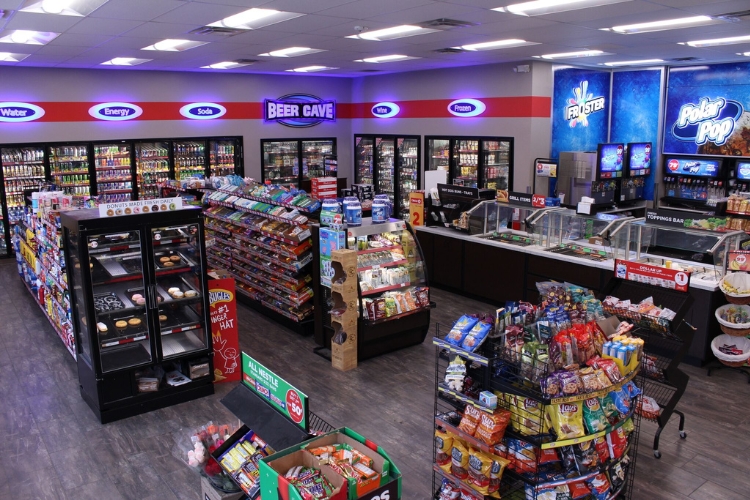 Convenience store with multiple retail displays, coolers, shelving and gondolas